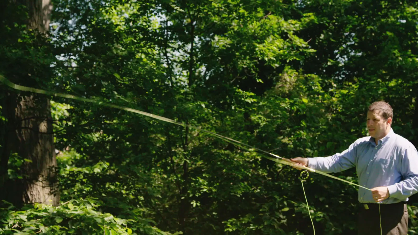Ricky Lapidus, dean of faculty, demonstrates fly fishing