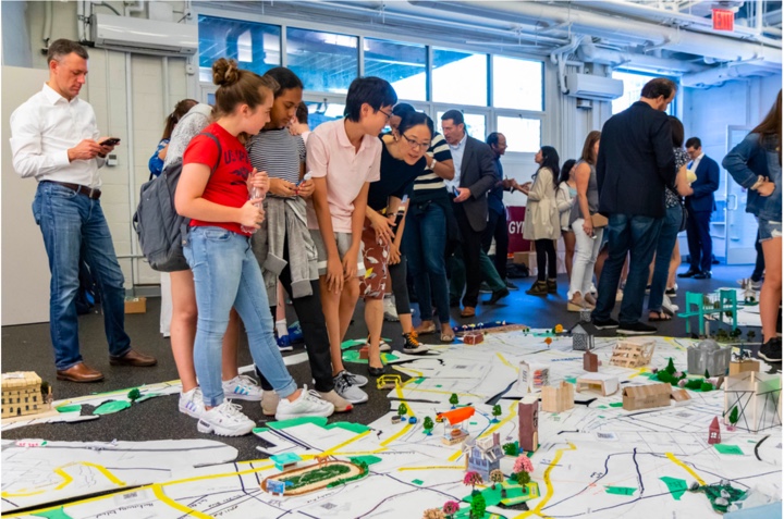 In sixth-grade history, students research every aspect of a New York City neighborhood and then work together on a giant 3D map of all five boroughs.