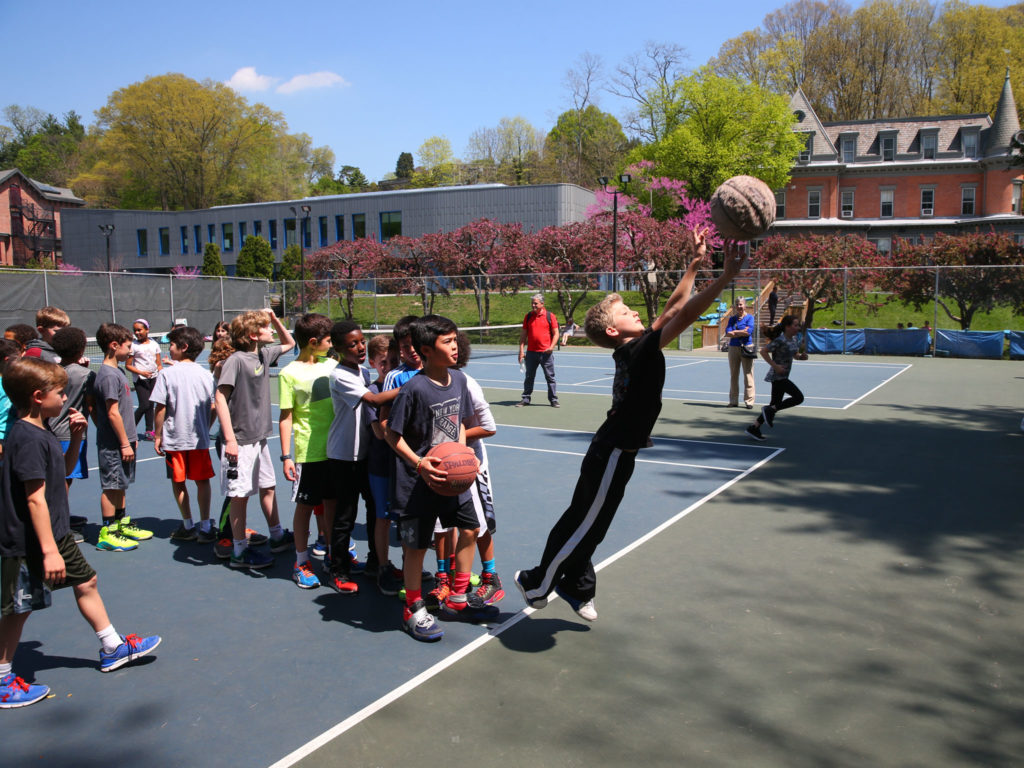 Tennis courts are used for recess games and physical education classes.