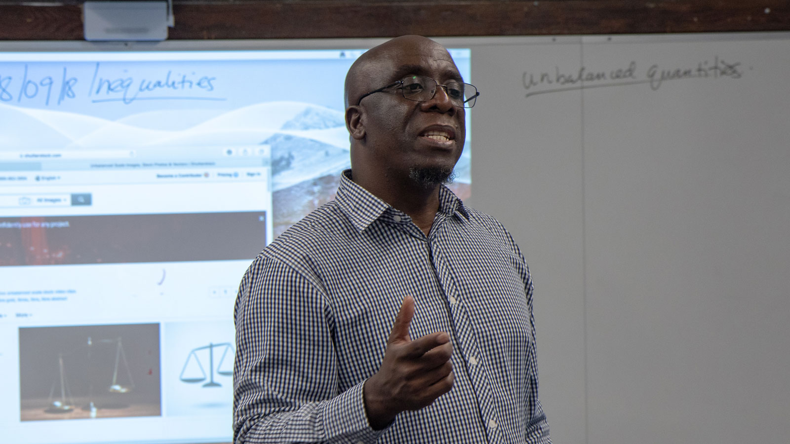 Philip Mapfumo, a Zagat Global Fellow, teaches a Middle School math class.