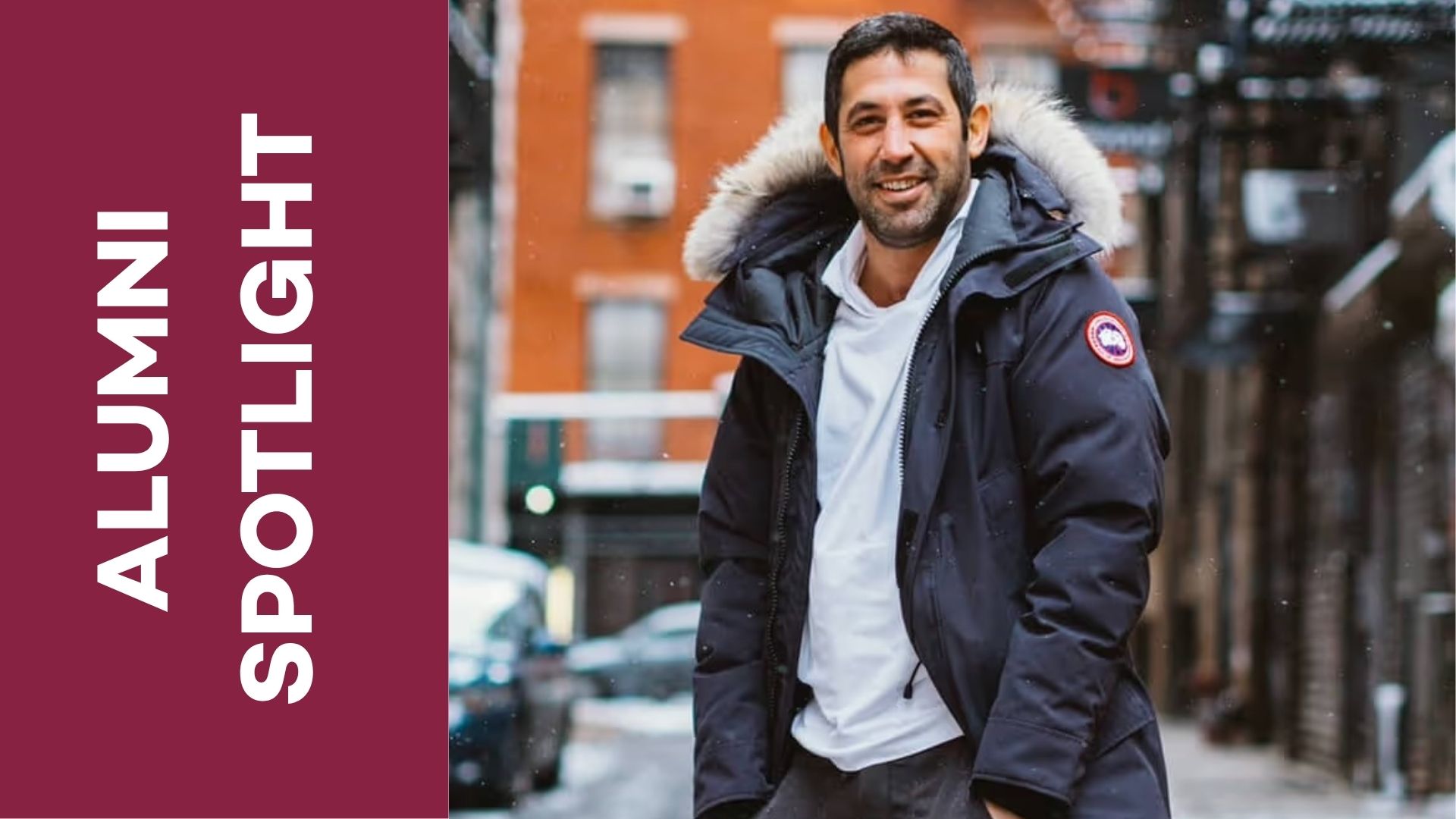 A man stands on a city street. Text beside him reads "Alumni Spotlight"